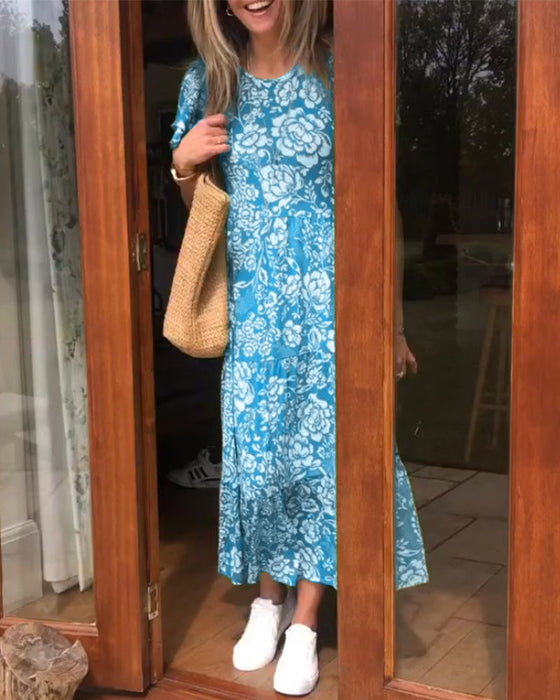 Kortärmad långklänning med blommönster