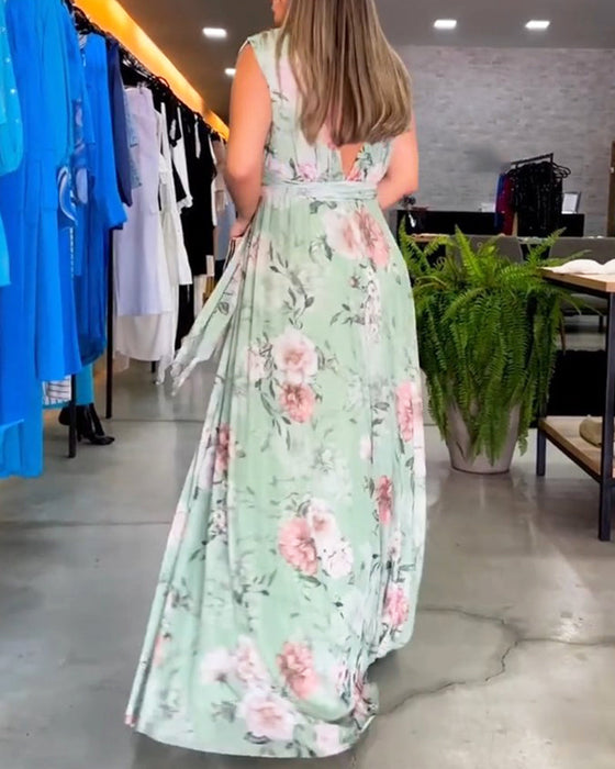 Blommig V-ringad elegant ärmlös klänning