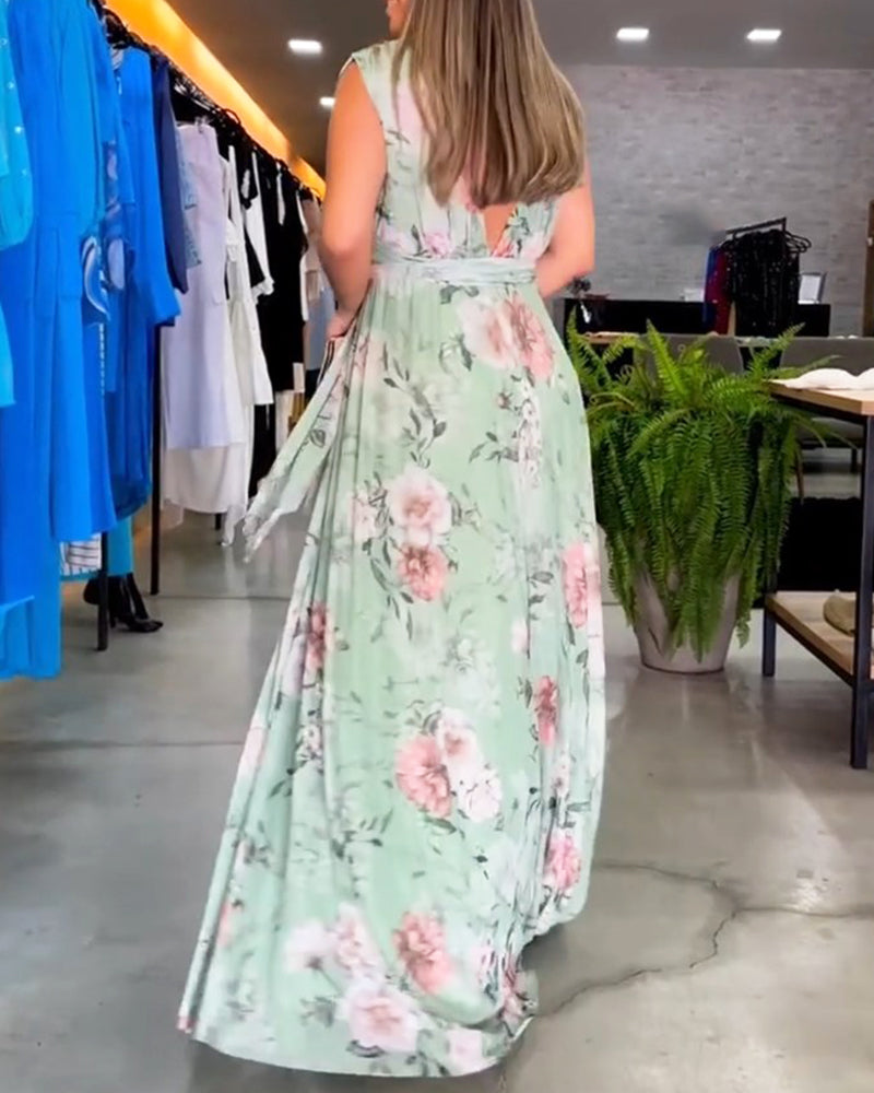 Blommig V-ringad elegant ärmlös klänning