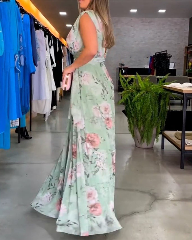 Blommig V-ringad elegant ärmlös klänning