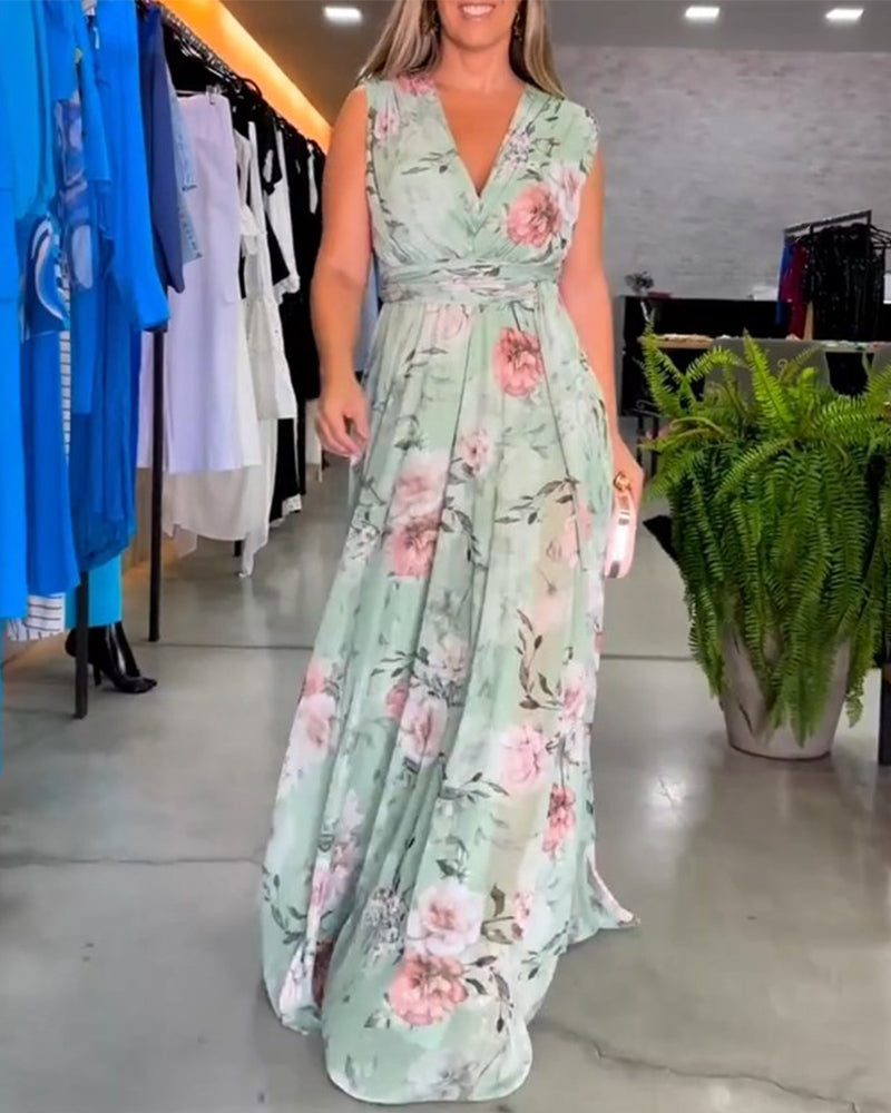 Blommig V-ringad elegant ärmlös klänning