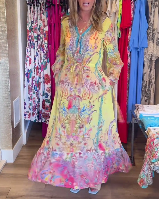 Långärmad resortklänning med tryck