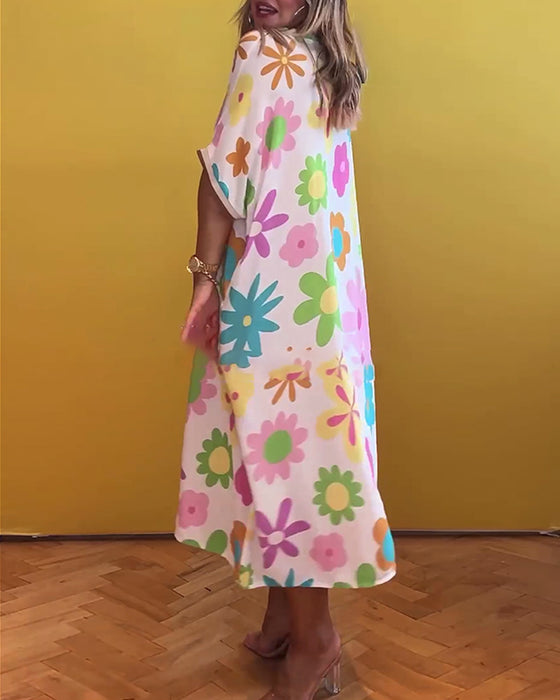 Lös V-ringad klänning med blommönster