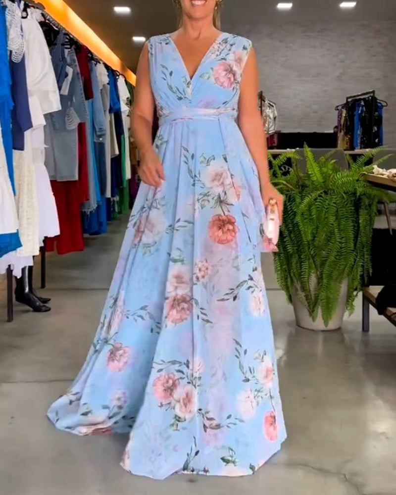 Blommig V-ringad elegant ärmlös klänning