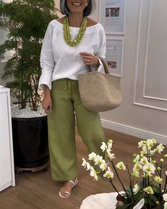 Enkelt Topp Med Rund Hals, Entydig Färg Och Långa Ärmar