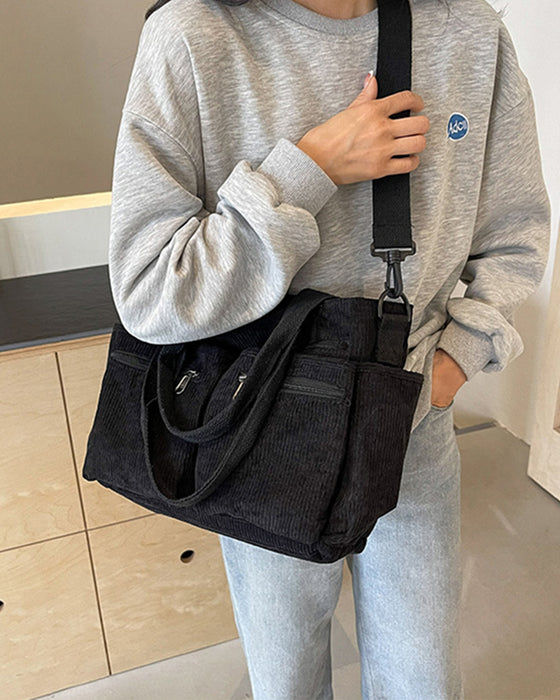 Enfärgad manchesterväska