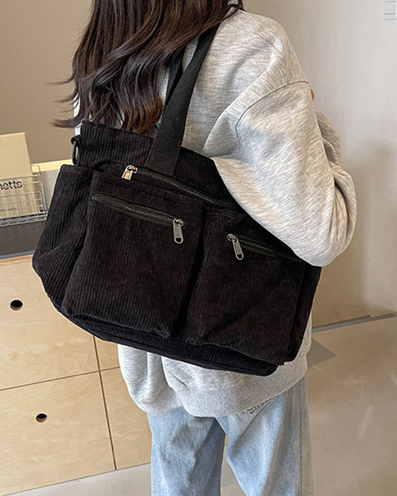 Enfärgad manchesterväska