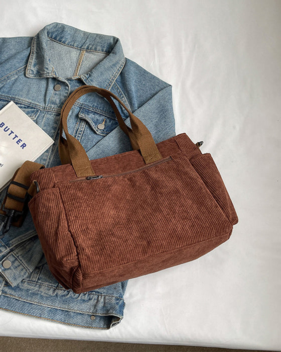 Enfärgad manchesterväska