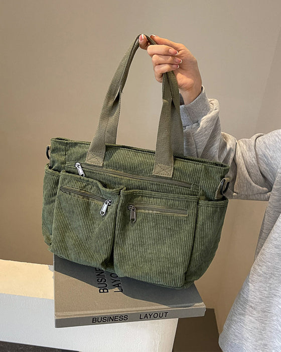 Enfärgad manchesterväska