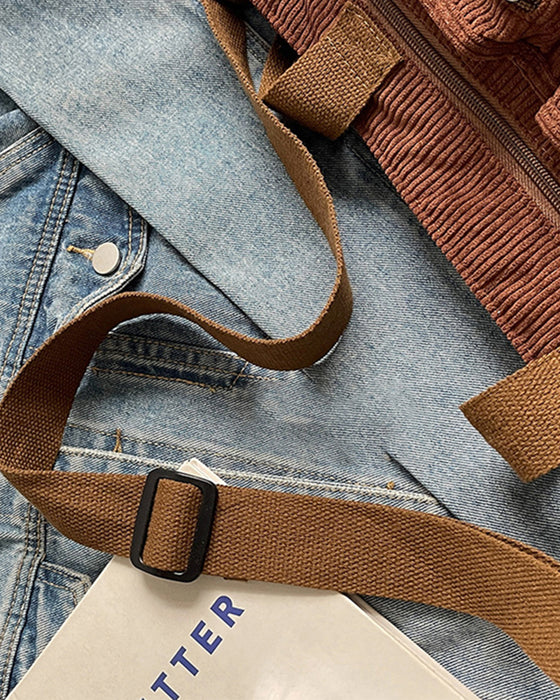 Enfärgad manchesterväska