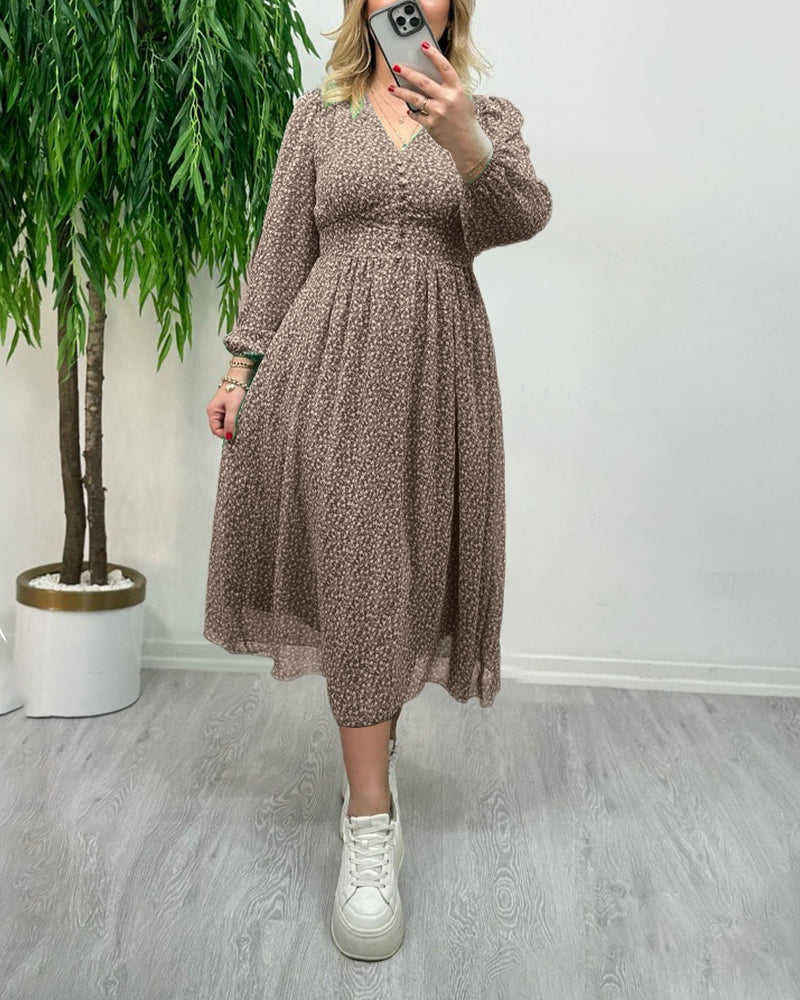 Elegant klänning med tryck