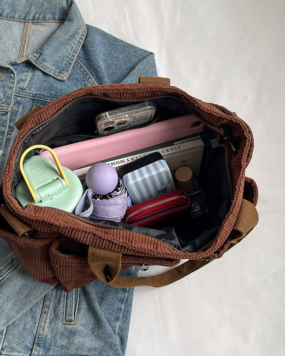 Enfärgad manchesterväska