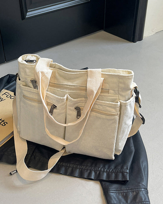 Enfärgad manchesterväska