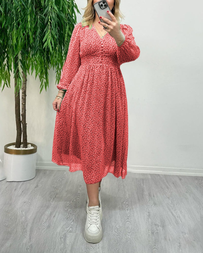 Elegant klänning med tryck