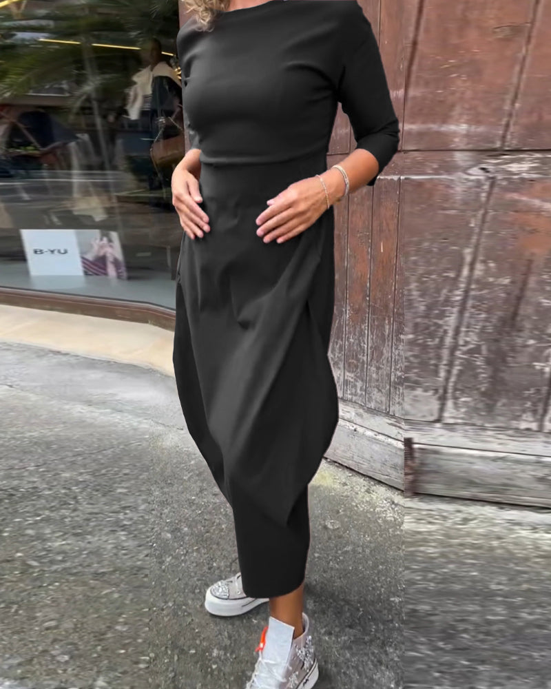 Enkel långärmad klänning i enfärgad ficka