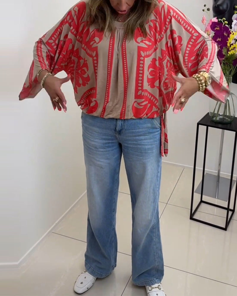 Långärmad avslappnad topp med rund hals med tryck