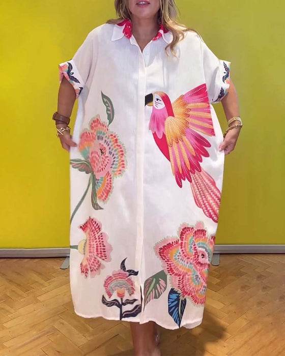 Lång tryckt klänning med slag