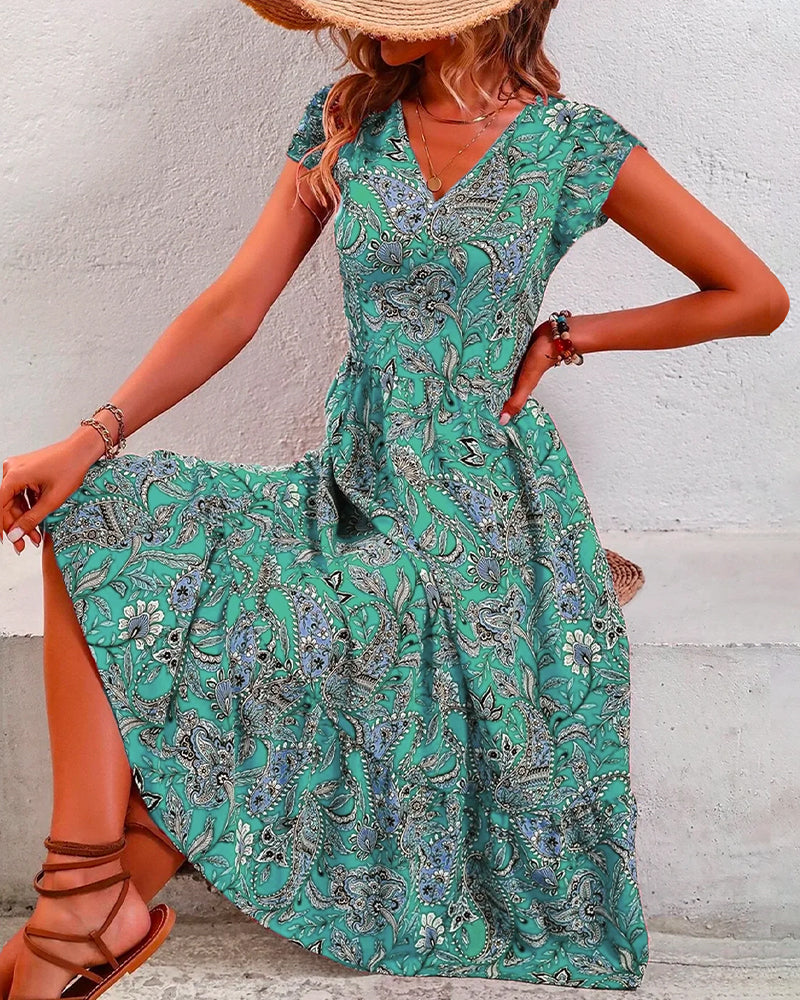 Kortärmad blommig klänning med V-ringad