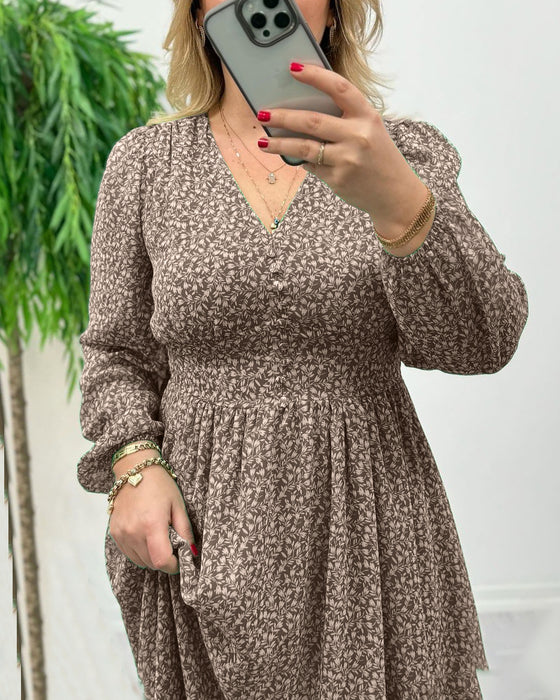 Elegant klänning med tryck