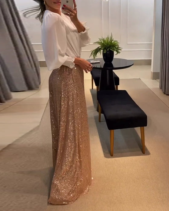 Elegant enfärgad blus med V-ringad lyktaärm