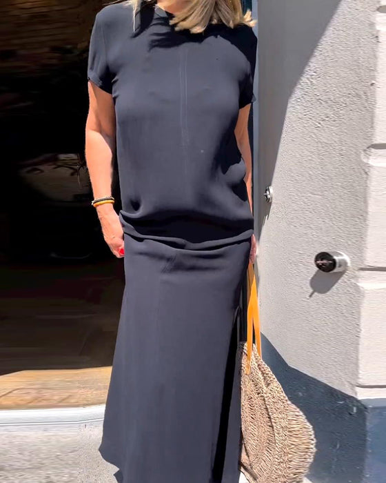 Elegant klänning med korta ärmar i enfärgad