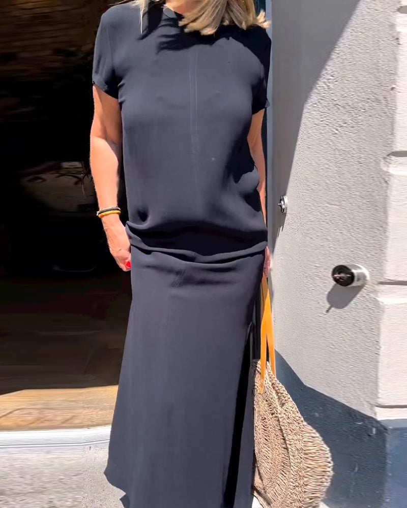 Elegant klänning med korta ärmar i enfärgad