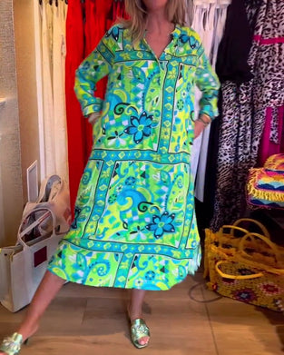 Klänningar med lös passform och tryck och fickor