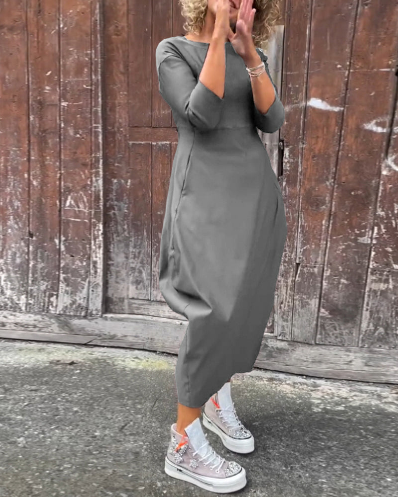 Enkel långärmad klänning i enfärgad ficka
