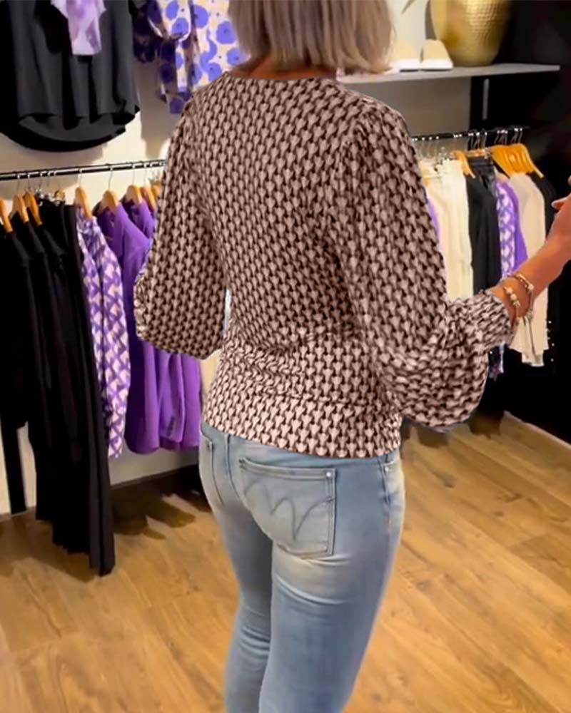 Långärmad topp med djup V-ringning