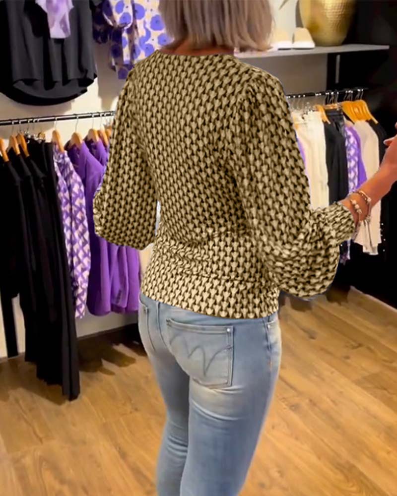 Långärmad topp med djup V-ringning