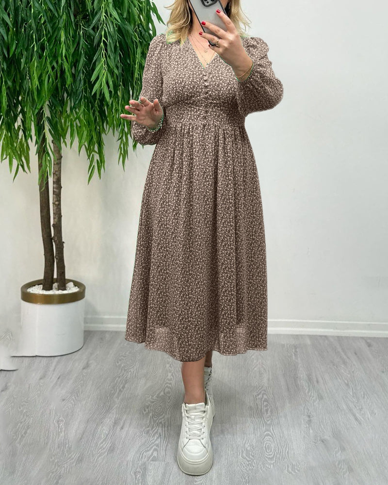 Elegant klänning med tryck