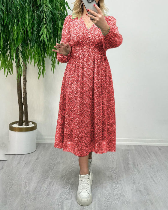 Elegant klänning med tryck