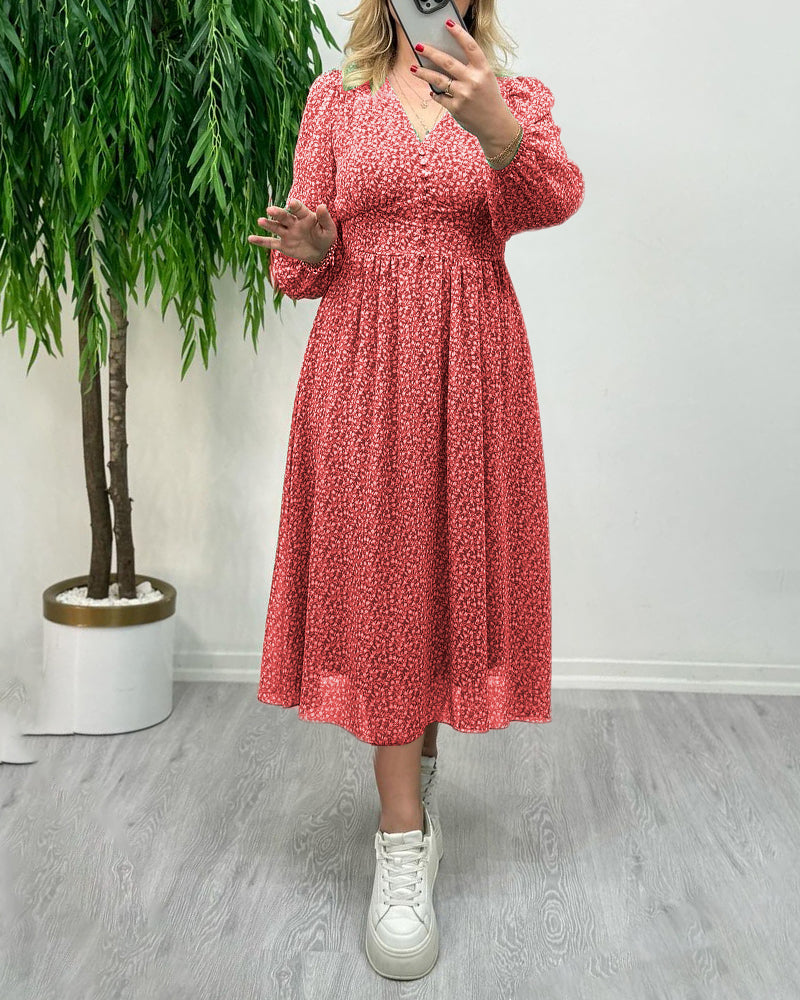 Elegant klänning med tryck