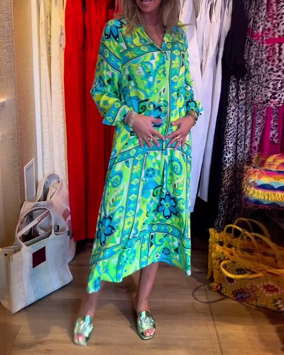 Klänningar med lös passform och tryck och fickor