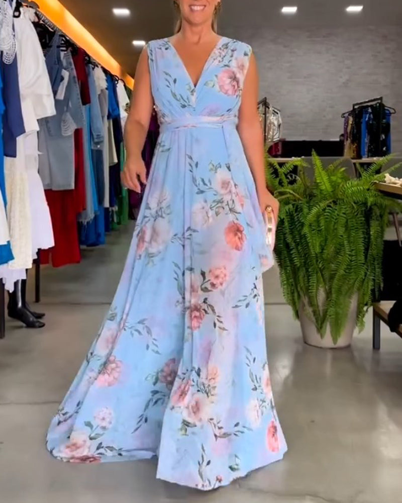 Blommig V-ringad elegant ärmlös klänning