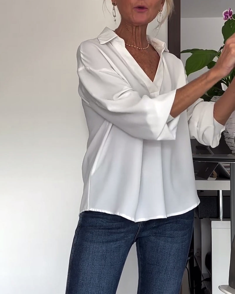 Enkel enfärgad topp med lapel och lång ärm