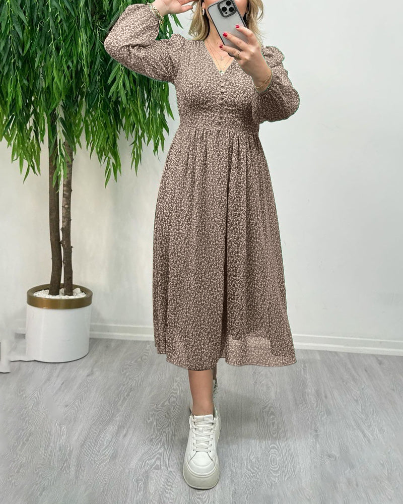 Elegant klänning med tryck