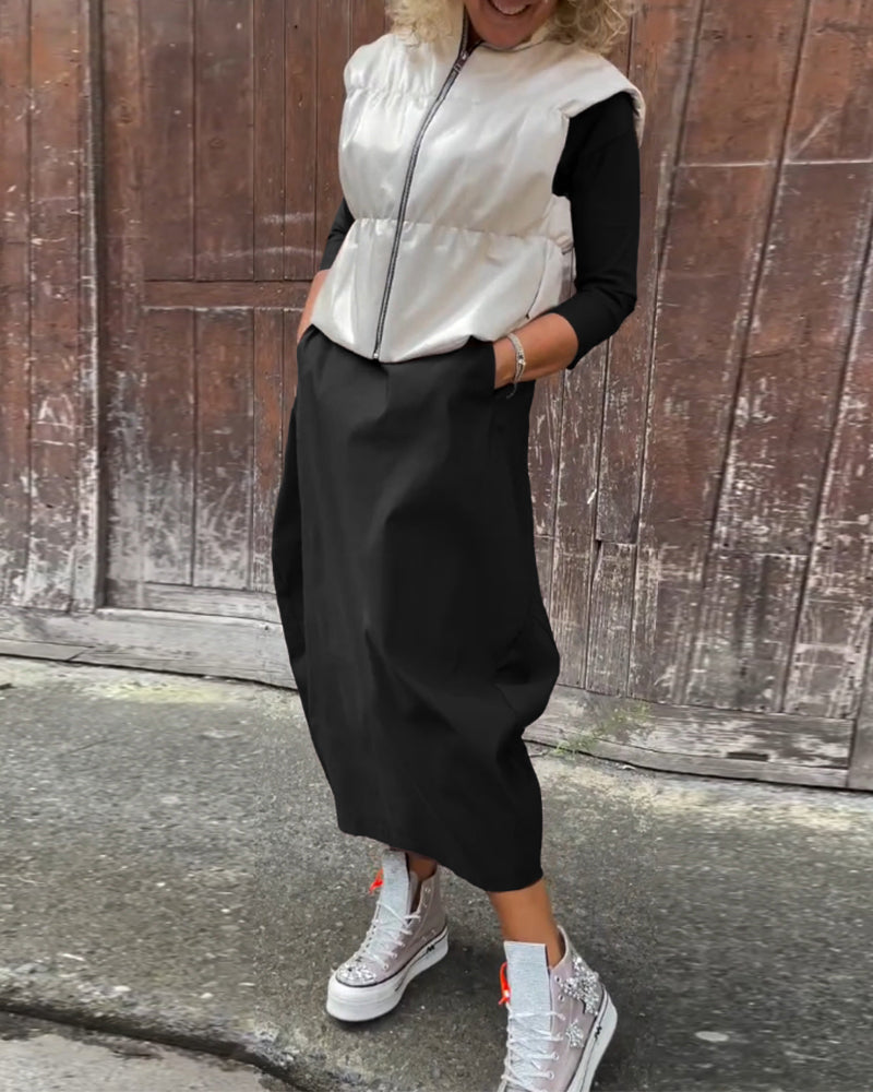 Enkel långärmad klänning i enfärgad ficka