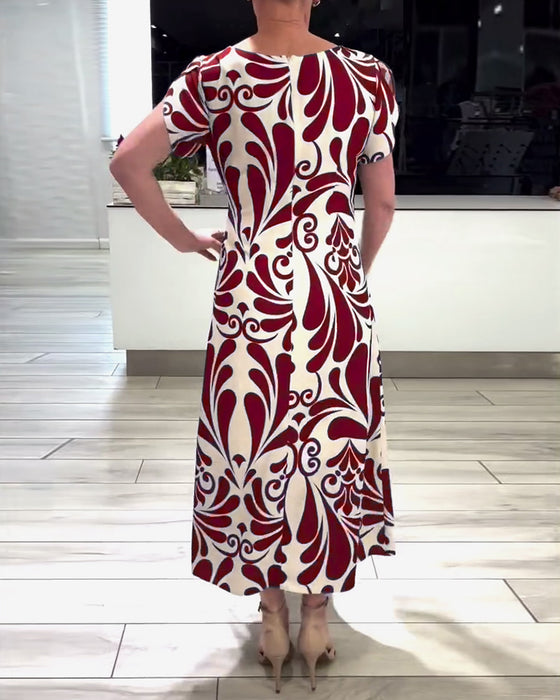 Elegant kortärmad klänning med kontrasttryck