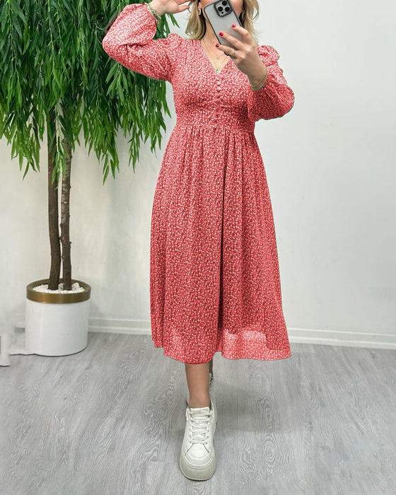 Elegant klänning med tryck