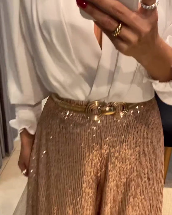 Elegant enfärgad blus med V-ringad lyktaärm