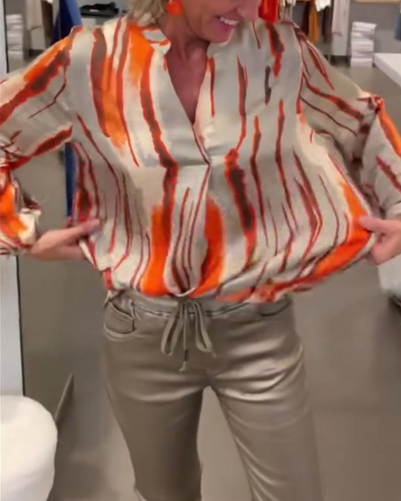 Långärmad blus med randigt tryck