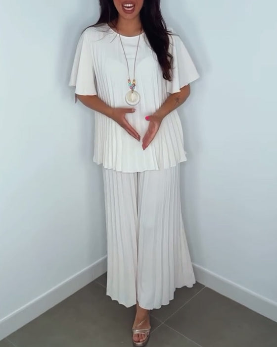 Enfärgade plisserade lösa set