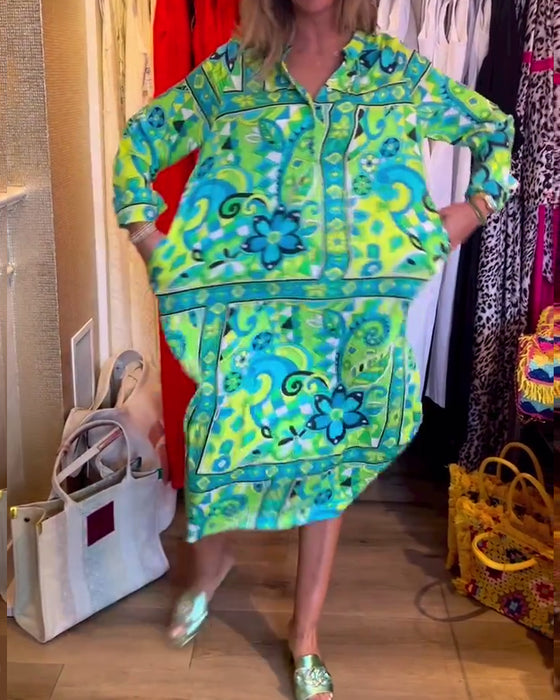 Klänningar med lös passform och tryck och fickor