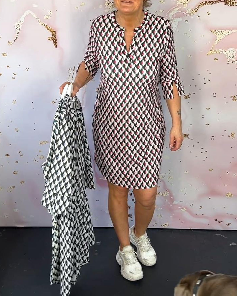 Klänning med mönster och ficka