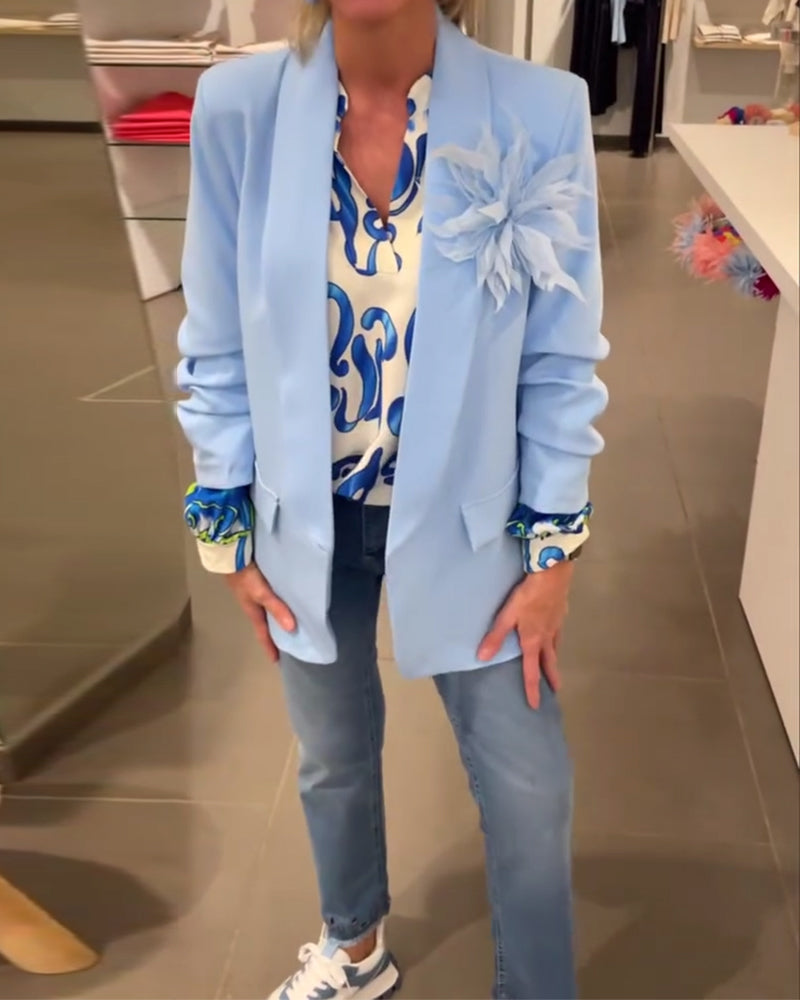 Elegant långärmad topp med tryckt V-ringning