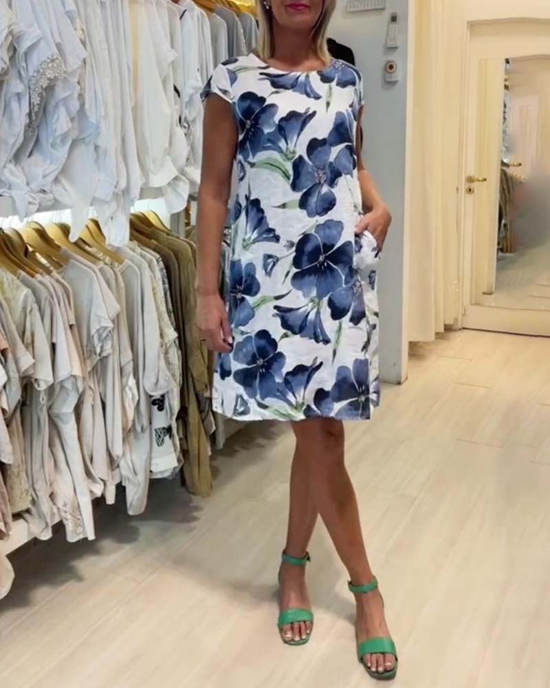 Kortärmad klänning med blommönster