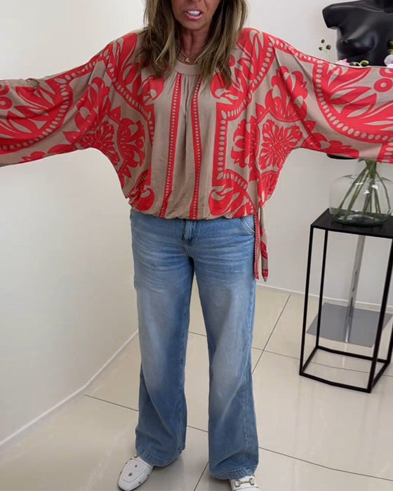 Långärmad avslappnad topp med rund hals med tryck