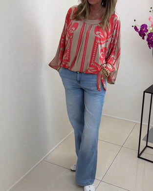 Långärmad avslappnad topp med rund hals med tryck