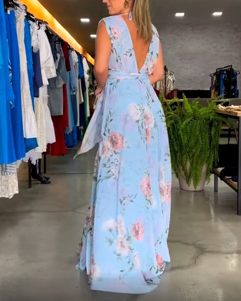 Blommig V-ringad elegant ärmlös klänning